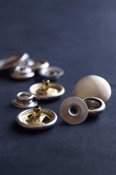Metalen knop
